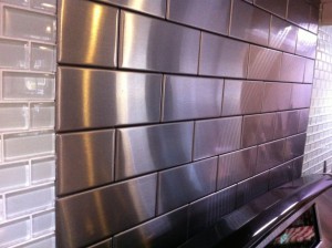 Stainless tiles were a great match for the glass tiles