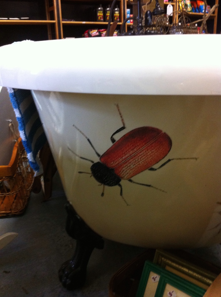 A claw-foot tub with,...bugs on it ! LOL
