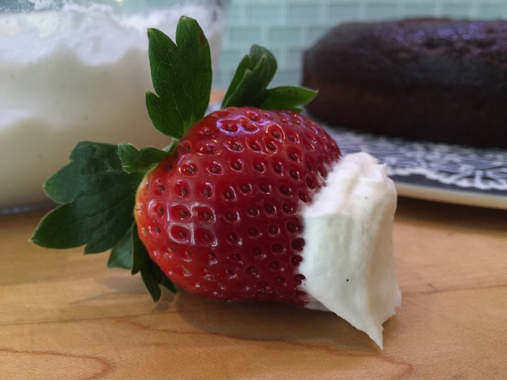 Vegan heaven - coconut milk frosting on a super fresh strawberry ! OMG!!